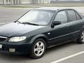 Mazda 323 2002 года за 1 800 000 тг. в Алматы – фото 6