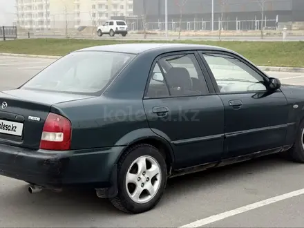 Mazda 323 2002 года за 1 800 000 тг. в Алматы – фото 8