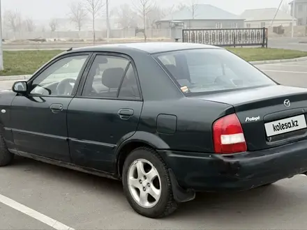 Mazda 323 2002 года за 1 800 000 тг. в Алматы – фото 7