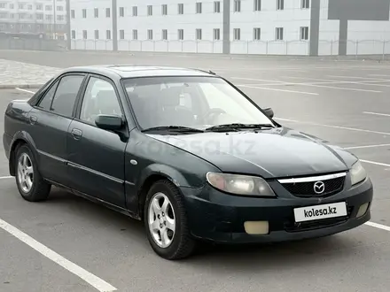 Mazda 323 2002 года за 1 800 000 тг. в Алматы – фото 5