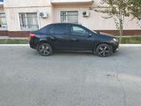 Renault Logan 2015 года за 2 500 000 тг. в Атырау – фото 2
