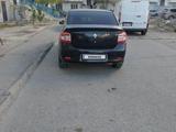 Renault Logan 2015 года за 2 500 000 тг. в Атырау – фото 3