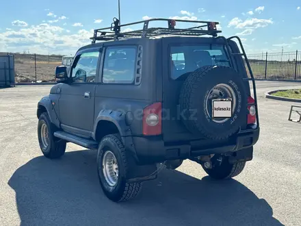 SsangYong Korando 1999 года за 4 500 000 тг. в Караганда – фото 4