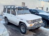 Toyota Land Cruiser 1993 года за 10 000 000 тг. в Астана – фото 3