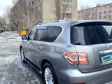 Nissan Patrol 2011 года за 12 500 000 тг. в Астана – фото 2