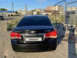 Chevrolet Cruze 2012 года за 3 800 000 тг. в Жезказган – фото 2