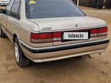 Mazda 626 1991 года за 850 000 тг. в Жанаозен – фото 2