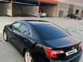 Toyota Camry 2012 года за 7 500 000 тг. в Жанаозен – фото 7