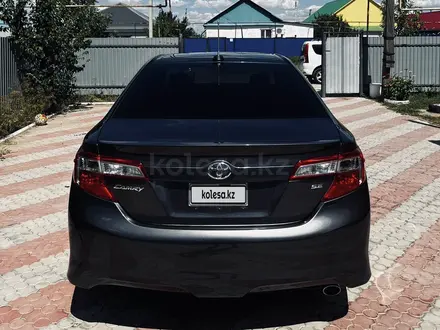 Toyota Camry 2014 года за 4 900 000 тг. в Уральск – фото 9