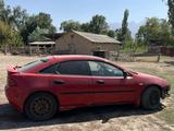 Mazda 323 1995 года за 670 000 тг. в Алматы – фото 4