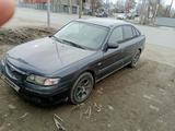 Mazda 626 1997 года за 1 700 000 тг. в Актобе – фото 2