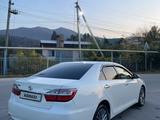 Toyota Camry 2015 года за 10 200 000 тг. в Алматы – фото 4