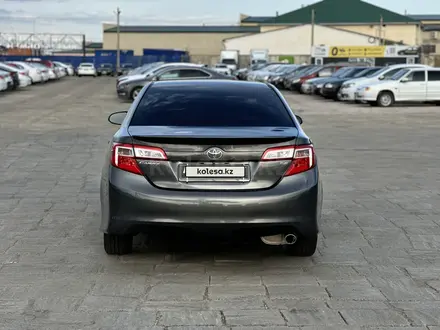Toyota Camry 2013 года за 8 000 000 тг. в Атырау – фото 4