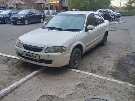 Mazda Familia 2000 года за 870 000 тг. в Астана