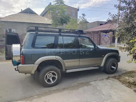 Nissan Patrol 2000 года за 5 600 000 тг. в Шымкент – фото 24