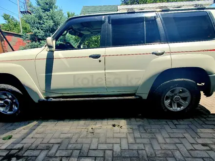 Nissan Patrol 2008 года за 11 200 000 тг. в Алматы – фото 7