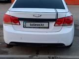 Chevrolet Cruze 2011 года за 3 200 000 тг. в Актобе – фото 4