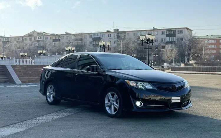 Toyota Camry 2014 года за 6 300 000 тг. в Атырау