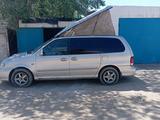 Kia Carnival 2002 годаүшін1 300 000 тг. в Жезказган – фото 2