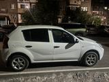 Renault Sandero 2012 года за 2 800 000 тг. в Караганда – фото 4