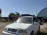 Suzuki Grand Vitara 2000 года за 2 800 000 тг. в Байсерке – фото 2