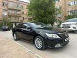 Toyota Camry 2014 года за 8 800 000 тг. в Жанаозен – фото 2