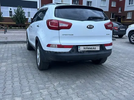 Kia Sportage 2013 года за 7 900 000 тг. в Актобе – фото 13