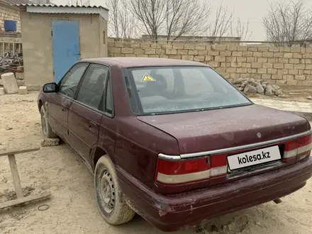 Mazda 626 1992 года за 400 000 тг. в Жанаозен – фото 2