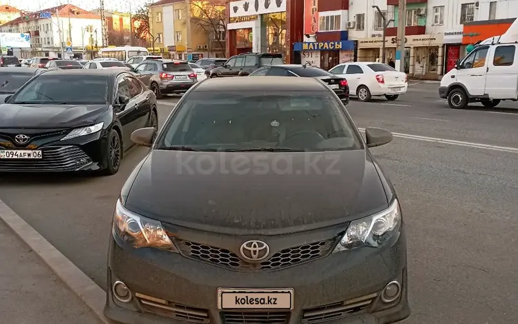 Toyota Camry 2014 года за 6 300 000 тг. в Атырау