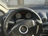 Renault Logan 2011 года за 2 290 000 тг. в Уральск – фото 2