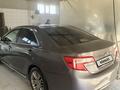 Toyota Camry 2014 года за 7 200 000 тг. в Жанаозен – фото 8