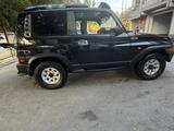 SsangYong Korando 2003 года за 2 700 000 тг. в Шымкент – фото 4