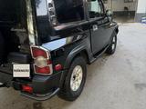 SsangYong Korando 2003 года за 2 700 000 тг. в Шымкент – фото 3