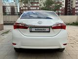 Toyota Corolla 2014 года за 6 800 000 тг. в Астана – фото 4