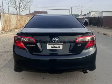 Toyota Camry 2014 года за 5 650 000 тг. в Кульсары – фото 5