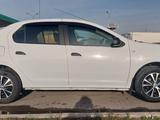 Renault Logan 2014 года за 3 700 000 тг. в Шымкент – фото 4