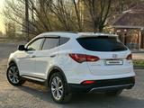 Hyundai Santa Fe 2013 года за 10 300 000 тг. в Актобе