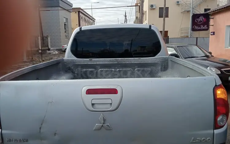 Mitsubishi L200 2011 года за 3 800 000 тг. в Атырау