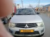 Mitsubishi L200 2011 года за 3 800 000 тг. в Атырау – фото 2