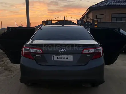 Toyota Camry 2013 года за 5 500 000 тг. в Кульсары – фото 2