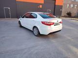Kia Rio 2013 года за 4 600 000 тг. в Караганда – фото 4