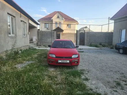Mazda 323 1995 года за 1 300 000 тг. в Шымкент – фото 6