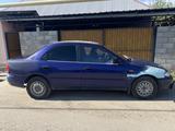 Mazda 323 1994 года за 850 000 тг. в Алматы – фото 4