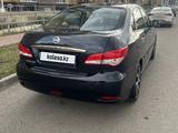 Nissan Almera 2013 года за 4 300 000 тг. в Актобе – фото 2