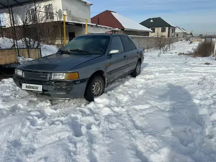 Mazda 323 1990 года за 500 000 тг. в Алматы – фото 2