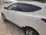 Hyundai Tucson 2013 годаfor7 559 238 тг. в Жанаозен – фото 3