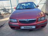 Mazda 626 1997 года за 2 000 000 тг. в Актобе – фото 2