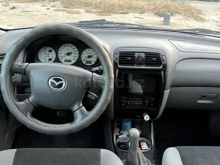 Mazda 626 2001 года за 3 000 000 тг. в Жанаозен – фото 11