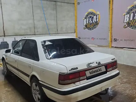 Mazda 626 1991 года за 650 000 тг. в Жанаозен – фото 4