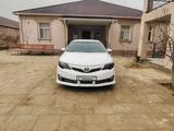 Toyota Camry 2013 года за 8 200 000 тг. в Жанаозен – фото 2